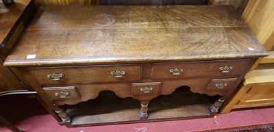 Lot 1253 - A contemporary joined oak dresser base, in the...