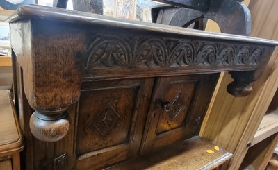 Lot 1268 - A contemporary joined and relief carved oak...