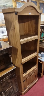 Lot 1269 - A modern pine freestanding open corner shelf,...