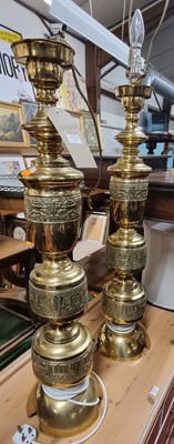 Lot 1274 - A pair of contemporary Eastern polished brass...