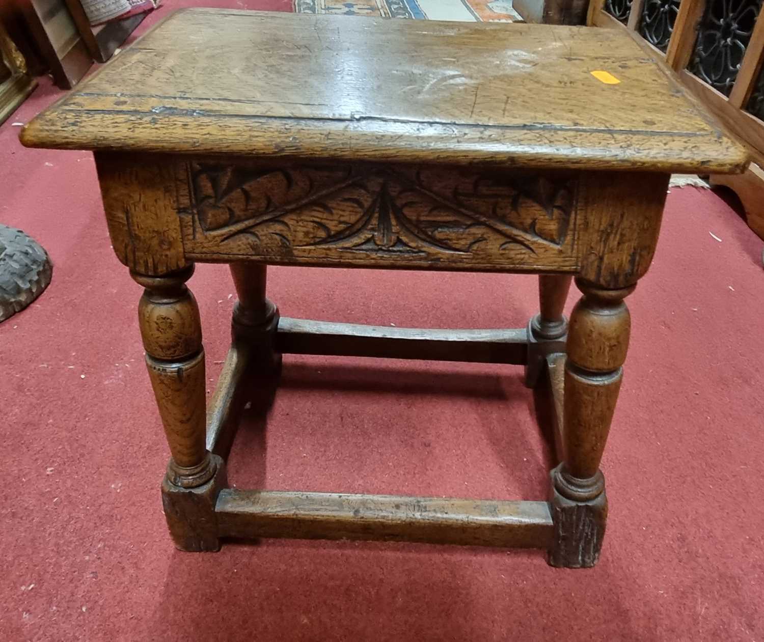 Lot 1279 - *A contemporary joined oak joint stool, in the...
