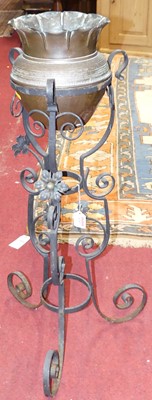 Lot 1297 - An early 20th century scroll wrought iron...