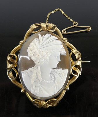 Lot 346 - A carved shell cameo portrait brooch, in...