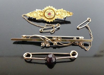 Lot 355 - A yellow metal and seed pearl set bar brooch,...