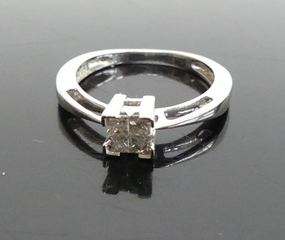 Lot 370 - A modern white metal diamond cluster ring,...