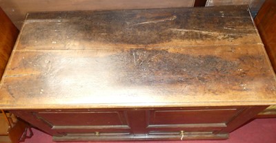 Lot 1332 - An 18th century joined oak mule chest, the...