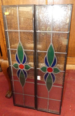 Lot 1344 - A pair of leaded coloured glass door panes,...