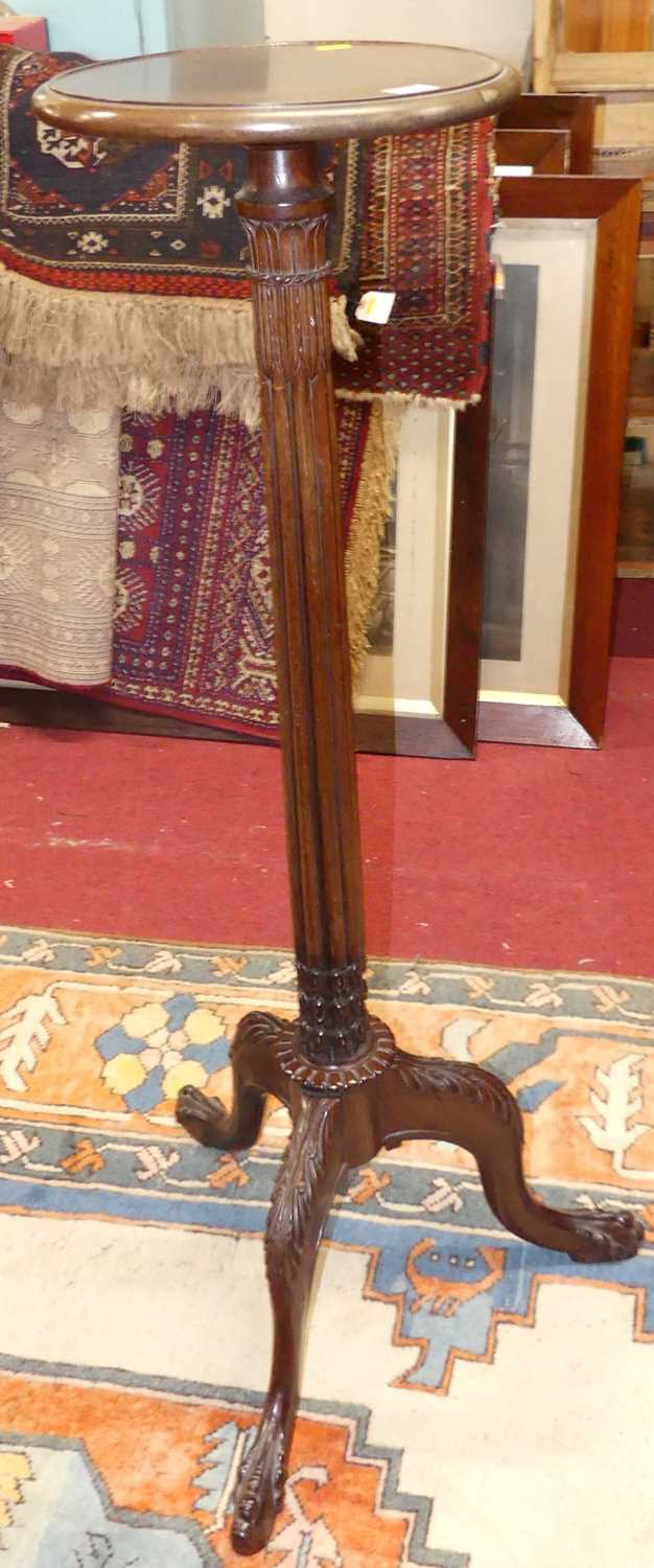 Lot 1349 - *An early 20th century mahogany plant stand,...