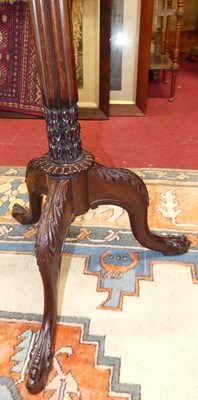Lot 1349 - *An early 20th century mahogany plant stand,...