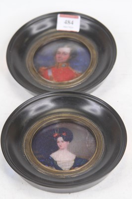 Lot 484 - A pair of reproduction portrait miniature...