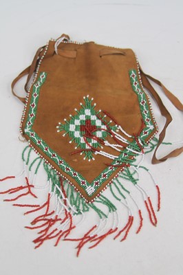 Lot 490 - A native American style beaded leather pouch,...