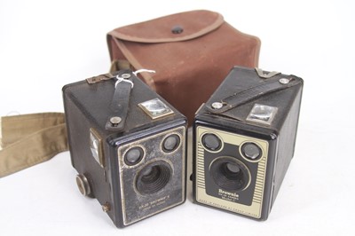 Lot 489 - A vintage Kodak Brownie camera, together with...