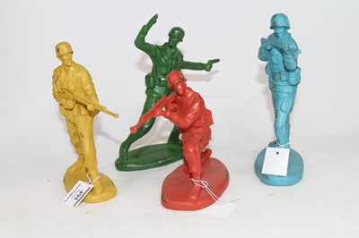 Lot 495 - A set of four coloured resin models of army...