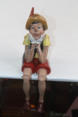 Lot 496 - A painted resin model of Pinocchio, shown...