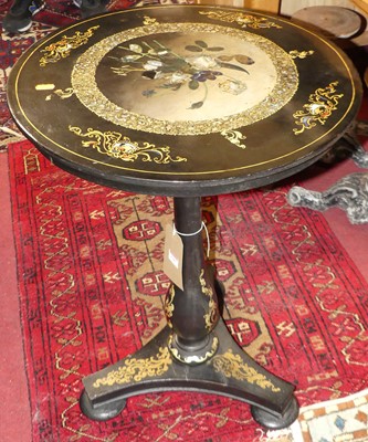 Lot 1387 - *A Victorian black lacquered, gilt decorated...