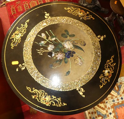 Lot 1387 - *A Victorian black lacquered, gilt decorated...