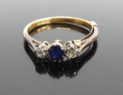 Lot 380 - An 18 carat gold sapphire and diamond three...