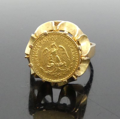 Lot 381 - A modern yellow metal signet ring set with a...