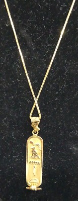 Lot 392 - A middle eastern high carat gold pendant...