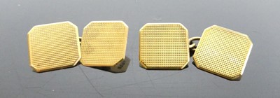 Lot 393 - A pair of 18 ct gold engine turned cuff links...