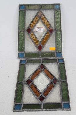 Lot 502 - *A pair of early 20th century stained glass...