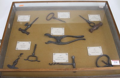 Lot 538 - A wall display of vintage corkscrews, 48 x 57cm