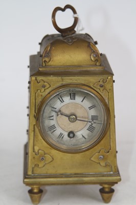 Lot 448 - A 19th century brass mantel clock, the...