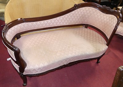 Lot 1410 - *A contemporary hardwood day bed, the shaped...