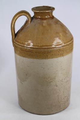 Lot 611 - A Doulton Lambeth stoneware flagon, h.46cm