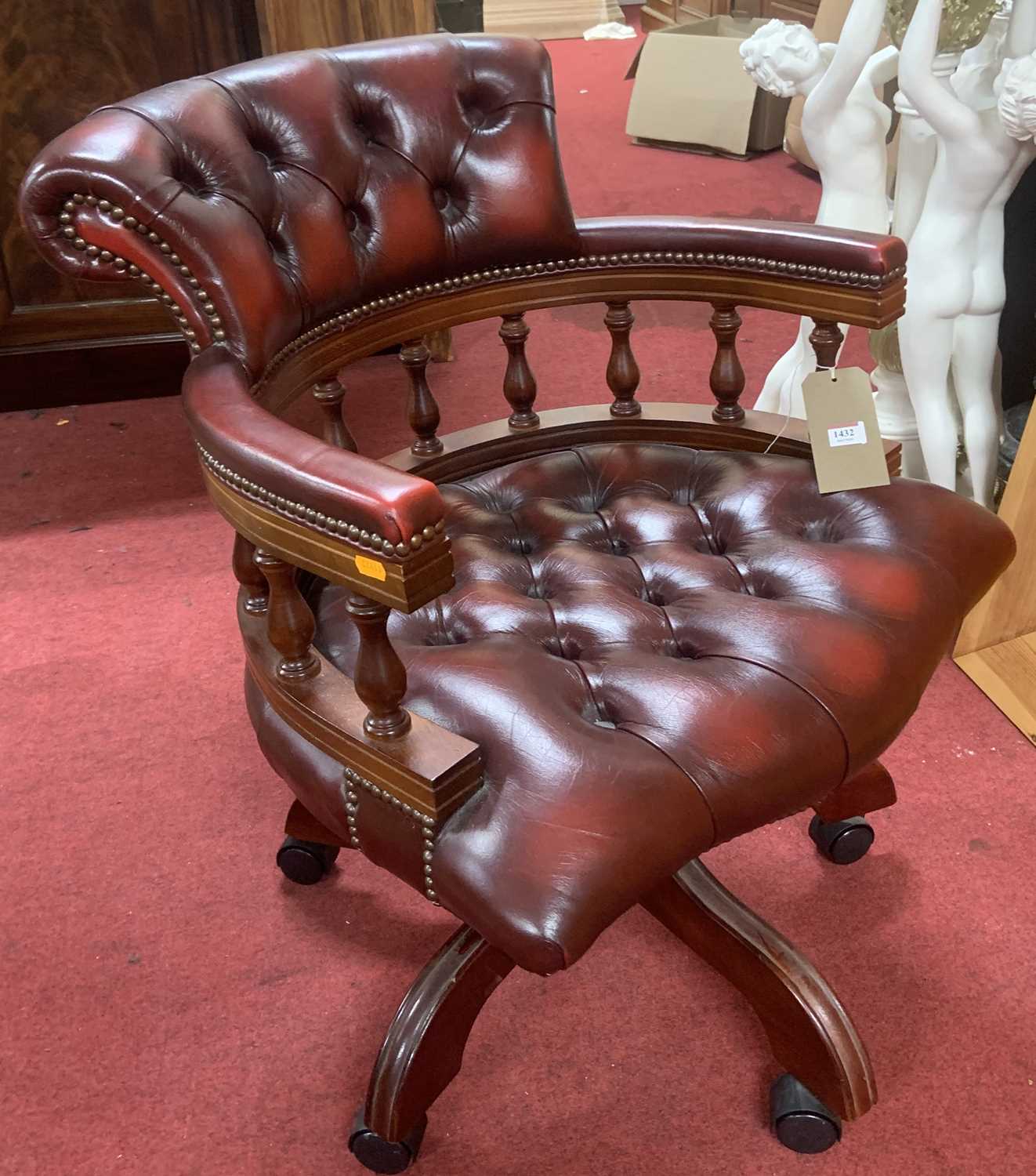 Lot 1432 - A contemporary mahogany and oxblood red...
