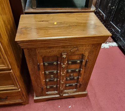 Lot 1435 - *A contemporary Eastern teak narrow chest of...