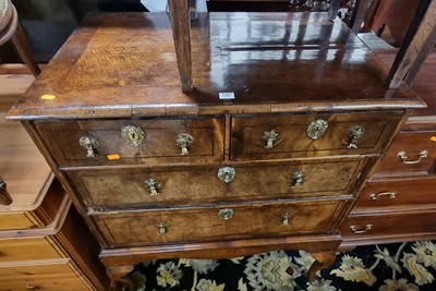 Lot 1445 - *An antique figured walnut and cross banded...