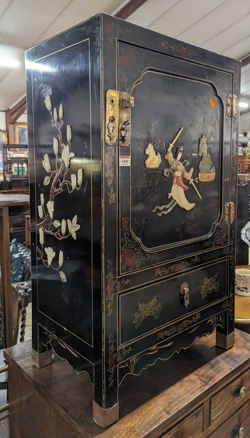 Lot 1460 - *An Oriental black lacquered gilt decorated...