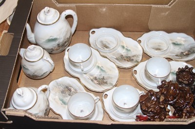 Lot 646 - A Japanese eggshell porcelain part tea service