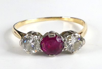 Lot 1280 - A yellow and white metal, ruby and diamond...