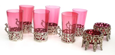 Lot 1121 - Three pairs of cranberry glass beakers in...
