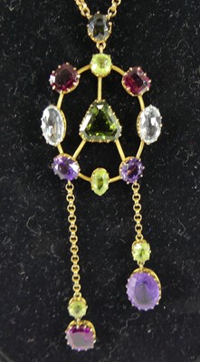 Lot 1265 - An Edwardian yellow metal multi-stone lariat...