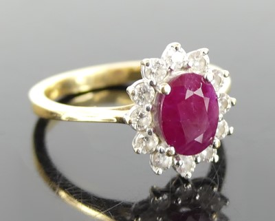 Lot 1283 - An 18ct yellow and white gold, ruby and...