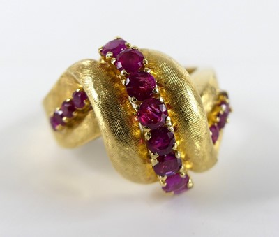 Lot 1281 - A yellow metal ruby multi-stone scrollwork...