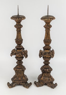 Lot 1372 - A pair of Baroque giltwood altar sticks, 18th...