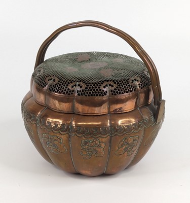 Lot 1434 - A Chinese copper hand warmer, 19th century, of...