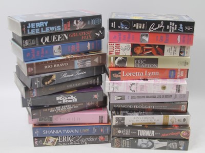 Lot 754 - A large collection of 22 original music videos,...