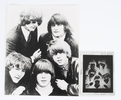 Lot 726 - Jim Morrison, a black and white photograph of...
