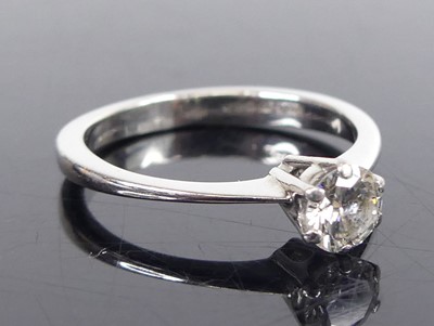 Lot 2574 - An 18ct white gold diamond solitaire ring,...