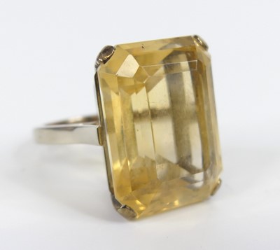 Lot 2614 - A yellow metal citrine single stone ring,...