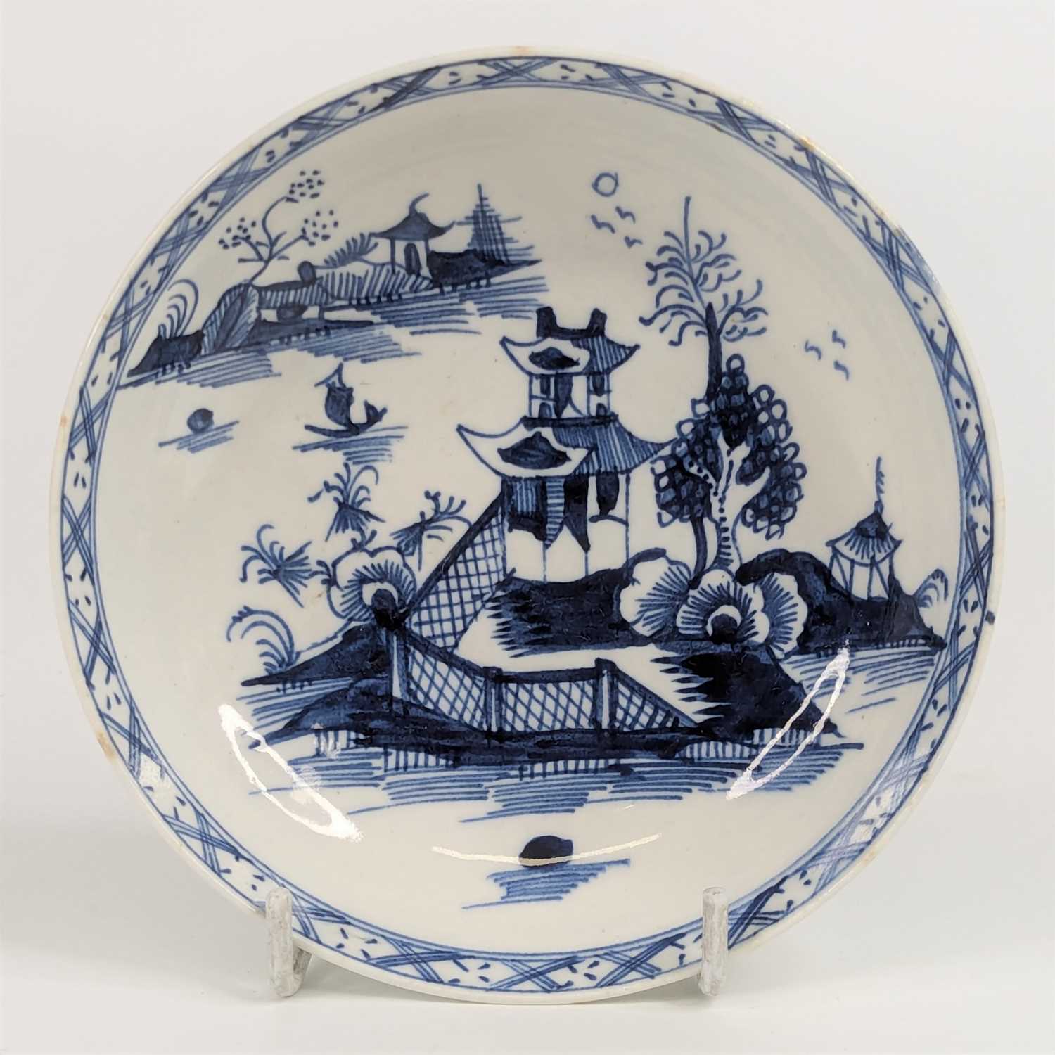 Lot 1097 - A Lowestoft porcelain saucer, circa 1770,...