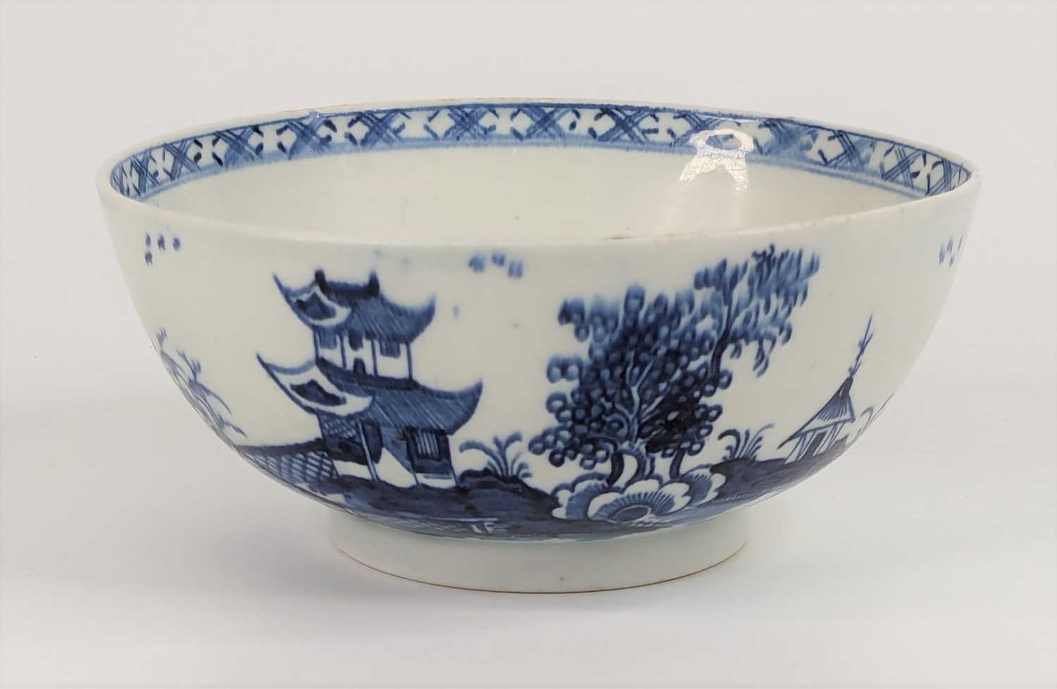 Lot 1093 - A Lowestoft porcelain slop bowl, circa 1780,...