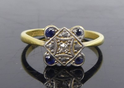 Lot 2633 - A yellow and white metal, sapphire and diamond...