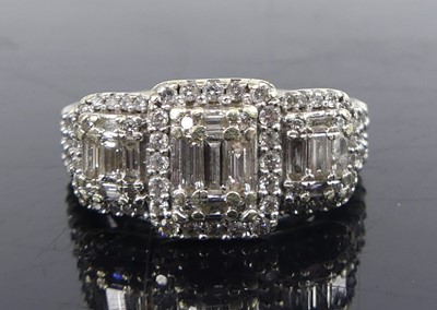 Lot A 14ct white gold diamond triple cluster ring,...