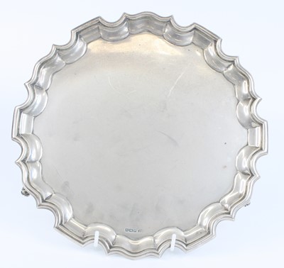 Lot 1205 - A George V silver salver, of shaped circular...
